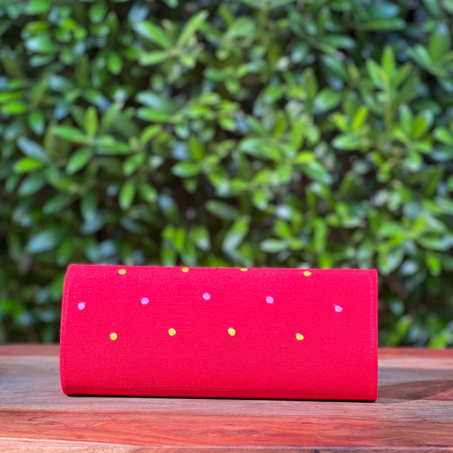 Embroidered clutch