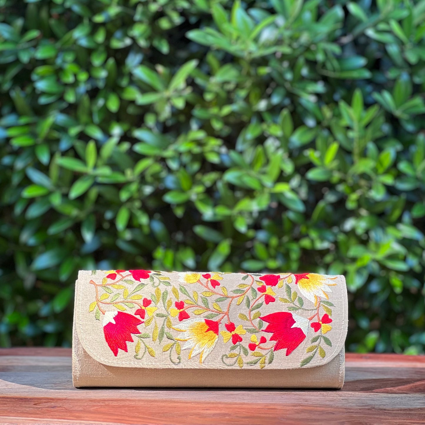 Embroidered clutch