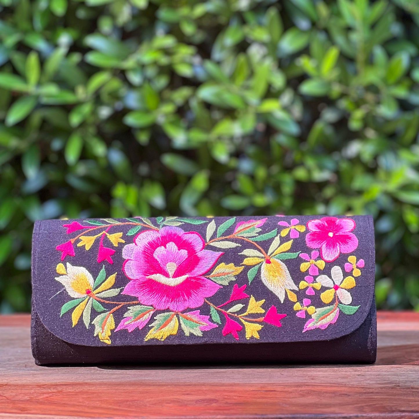 Embroidered clutch