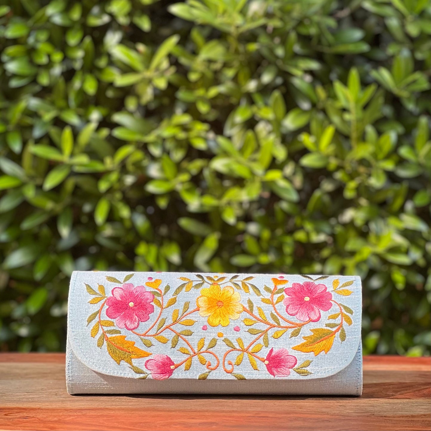 Embroidered clutch