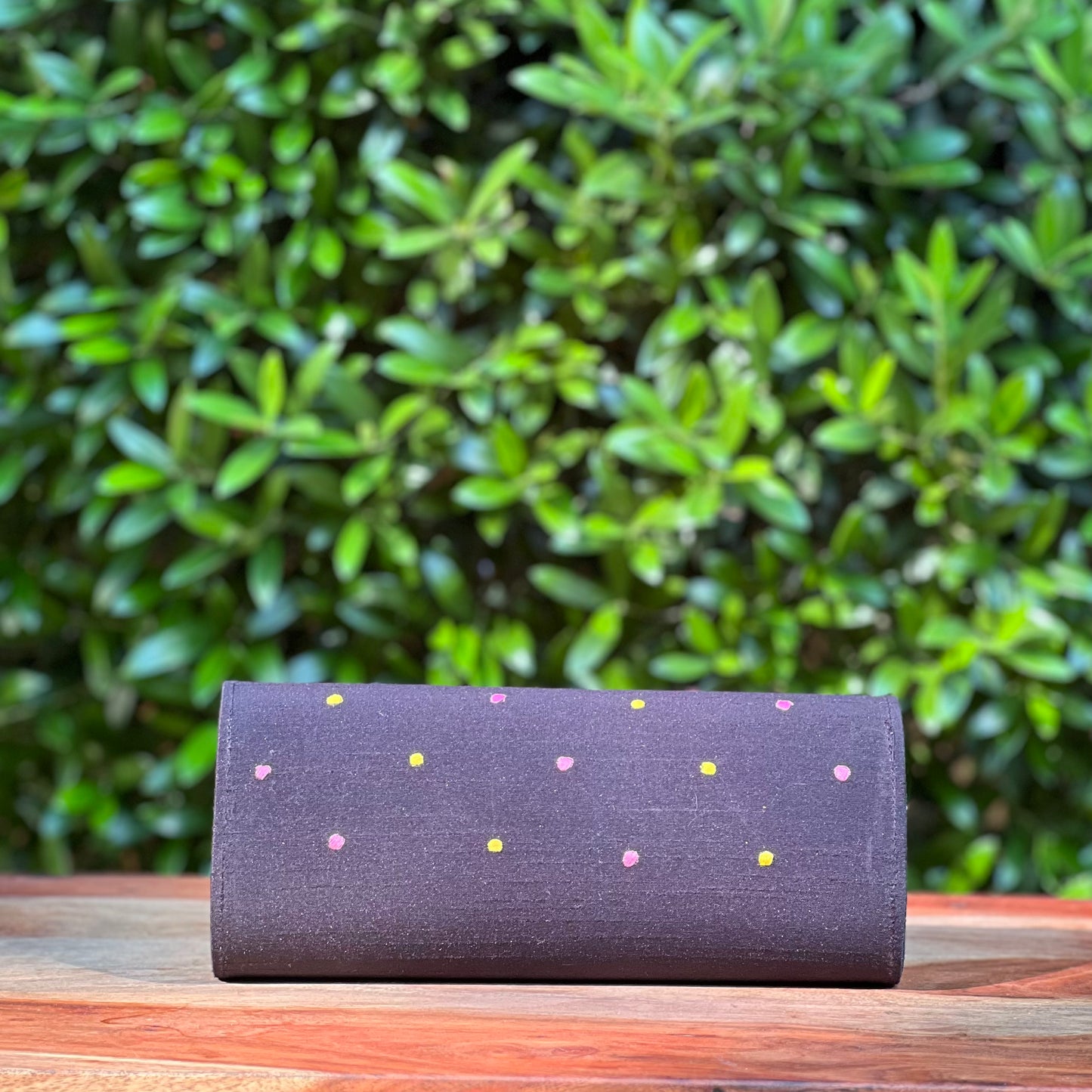 Embroidered clutch